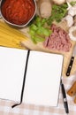 Cookbook recipe with ingredients for spaghetti bolognese, vertical, copy space