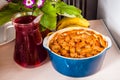 Cooked apetit dish beautifully decorated in a plate on a wooden table, natural light