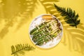 cooked asparagus in a plate