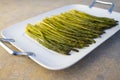 Cooked asparagus on a white plate Royalty Free Stock Photo