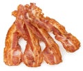 Cooked bacon rashers close-up isolated on a white background. Royalty Free Stock Photo
