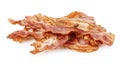 Cooked bacon rashers close-up isolated on a white background. Royalty Free Stock Photo