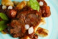 Cooked beef with vegetables on a wooden table Royalty Free Stock Photo