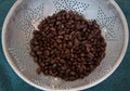 Cooked black beans in silver colander Royalty Free Stock Photo