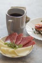 Cooked breakfast with coffee and sandwich. Royalty Free Stock Photo