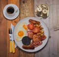 Cooked breakfast and a cup of coffee flat lay. Royalty Free Stock Photo