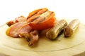 Cooked Breakfast Items on a Wooden Plate Royalty Free Stock Photo