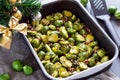 Cooked Brussel Sprouts with Pecan Nuts On a ChristmasTable