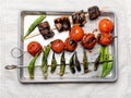 Cooked Cherry Tomatoes, Okra and Pork Skewers Royalty Free Stock Photo