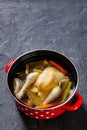 Cooked chicken bouillon of whole chicken in pot Royalty Free Stock Photo