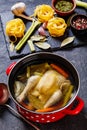 Cooked chicken bouillon of whole chicken in pot Royalty Free Stock Photo