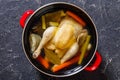 Cooked chicken bouillon of whole chicken in pot Royalty Free Stock Photo