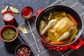 cooked chicken bouillon of whole chicken in pot Royalty Free Stock Photo