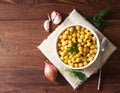 Cooked Chickpeas on bowl on dark wooden table. Healthy, vegetari