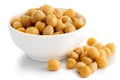 Cooked chickpeas in white bowl on white.