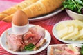 Cooked egg, roast beef, sliced cheese, arugula salad and roll bread Royalty Free Stock Photo