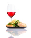 Cooked Fish with Glass Rose Wine on White Background Royalty Free Stock Photo