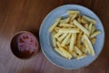 Light snacks to relax. Cooked fries and tomato sauce.