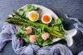 Cooked green asparagus with egg Royalty Free Stock Photo