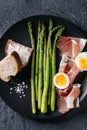 Cooked green asparagus with egg Royalty Free Stock Photo