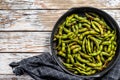 Cooked green edamame soybeans in a pan, japanese food. White background. Top view. Copy space Royalty Free Stock Photo