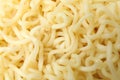 Cooked instant noodles on whole background, macro Royalty Free Stock Photo