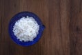 Cooked jasmine rice in bowl with napkin on wooden table. Thai Jasmine rice Royalty Free Stock Photo