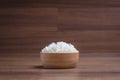 Cooked jasmine rice in wooden bowl in on wooden table. Thai Jasmine rice Royalty Free Stock Photo