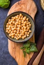 Cooked kidney beans, white beans, chickpeas and homemade hummus  on a plate, stone background. yop view Royalty Free Stock Photo