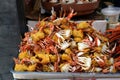 Cooked legs crab are on the shopping tray for sale in Wangfujiang street China