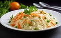 Cooked Long Grain Basmati Rice with Green Peas and Carrot Slices in White Plate, Vegetable Pulav