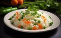 Cooked Long Grain Basmati Rice with Green Peas and Carrot Slices in White Plate, Vegetable Pulav