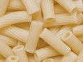 Cooked maccheroni pasta tubes food texture background Royalty Free Stock Photo