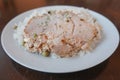 Cooked meat with rice on a plate