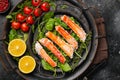 Cooked Organic Alaskan King Crab Legs with Butter, on black dark stone table background, top view flat lay Royalty Free Stock Photo