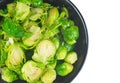 Cooked organic brussels sprouts in glass jare isolated on white background Royalty Free Stock Photo