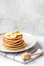 Cooked pancake on plate at wooden background Royalty Free Stock Photo
