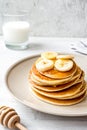 Cooked pancake on plate at wooden background Royalty Free Stock Photo