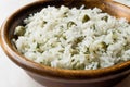 Cooked Plain Basmati Rice with Dill and Green Peas / Pilav or Pilaf in Wooden Bowl.