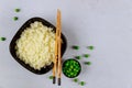 Cooked plain rice in black bowl on white background Royalty Free Stock Photo