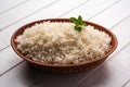 Cooked plain white basmati rice in terracotta bowl, selective focus