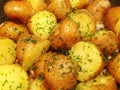 Cooked poatoes with paring and parsley Royalty Free Stock Photo