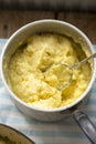 Cooked polenta dish with parmesan and butter