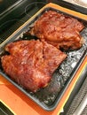 Cooked pork ribs straight out of the oven