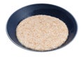 Cooked porridge from wheat groats in bowl isolated