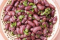 Cooked red beans plate on pink background, isolated. Healthy food Royalty Free Stock Photo