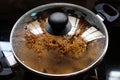 Cooked rice closed with transparent glass in the kitchen