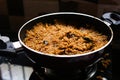 Cooked rice closed with transparent glass in the kitchen