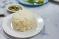 Cooked rice is ready to eat in the white dish on table dinner Royalty Free Stock Photo