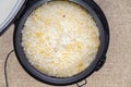 Cooked rice pilaf in a rice maker or steamer